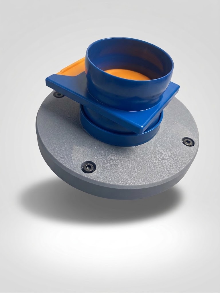 3D-printet kobling monteret med blå Loc-Line studs og manuelt orange afspærringsspjæld